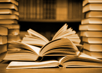 Stacks of open books